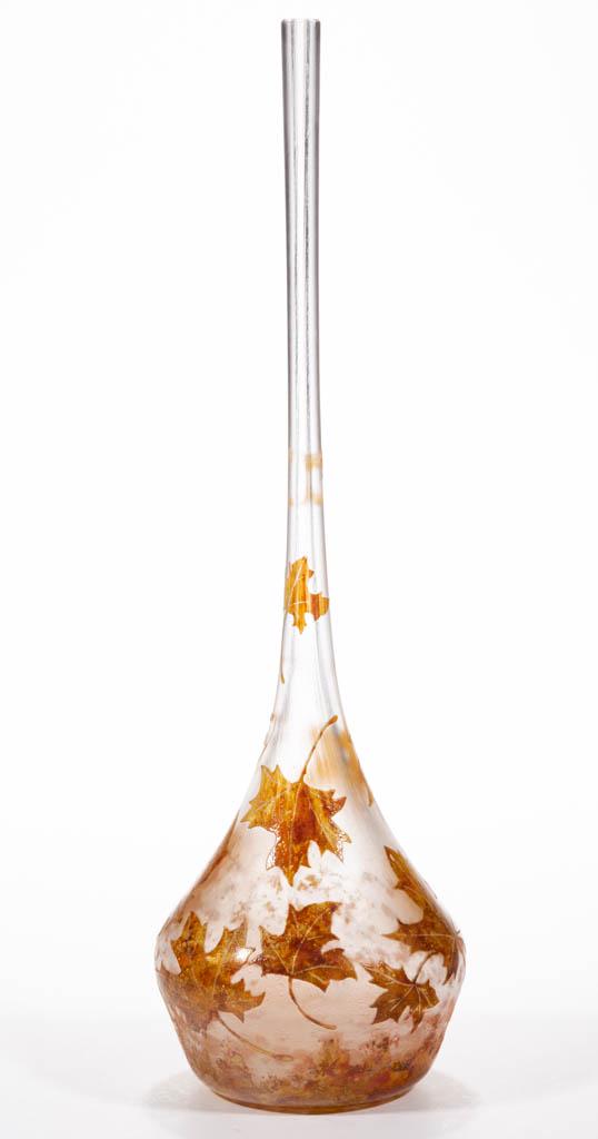 DAUM NANCY CAMEO MAPLE LEAVES ART GLASS BERLUZE VASE: DAUM NANCY CAMEO MAPLE LEAVES ART GLASS BERLUZE VASE, autumn colored leaves on a colorless ground, signed "DAUM/NANCY" at the base of the neck, plain base. France. First quarter 20th century. 13 3/4"