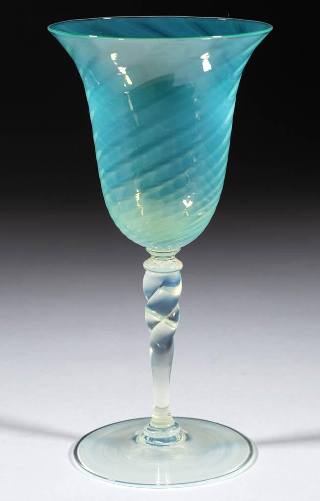 STEUBEN ATTRIBUTED ORIENTAL JADE GOBLET: STEUBEN ATTRIBUTED ORIENTAL JADE GOBLET, green opalescent swirled bowl, shape 6598, flaring mouth, raised on an Opaline twisted-stem and circular foot, polished pontil mark. Steuben Glass Works. Circa