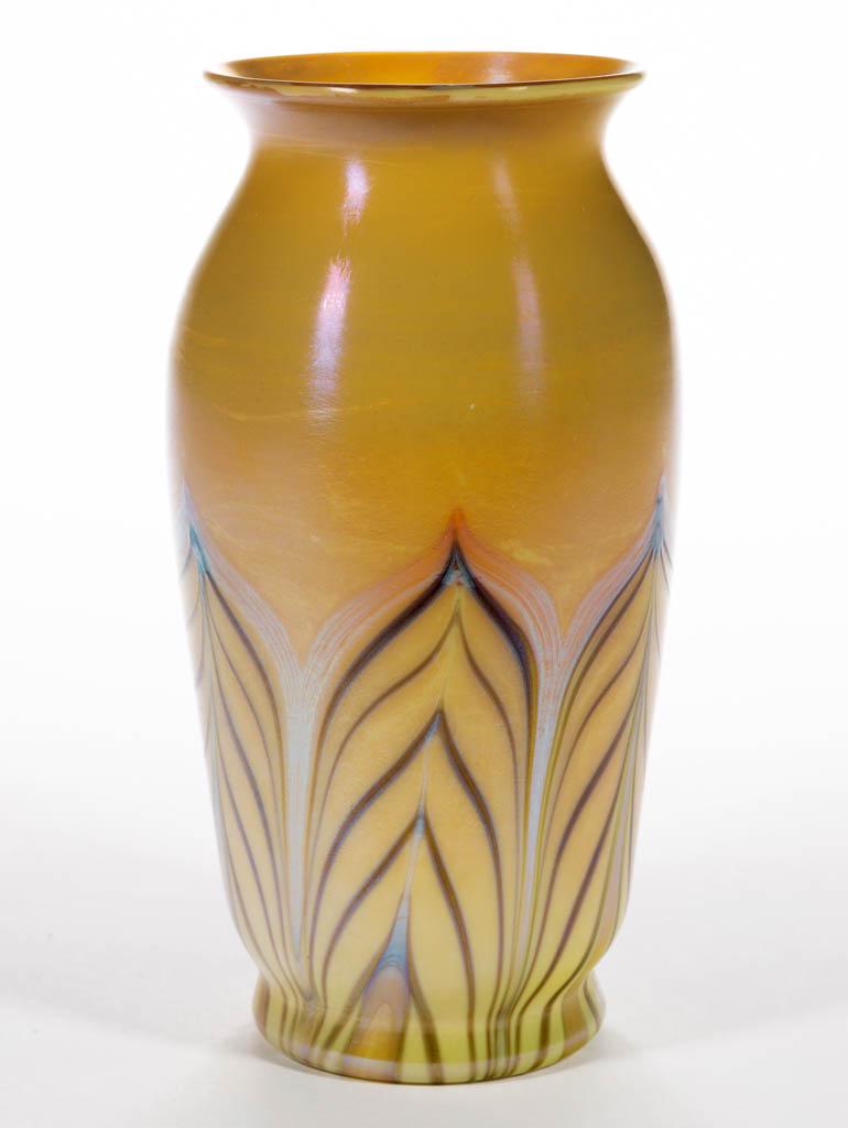DURAND PULLED FEATHER ART GLASS VASE: DURAND PULLED FEATHER ART GLASS VASE, yellow iridescent with amber and brown decoration, ovoid form with a flaring rim and tooled base, polished pontil mark signed "Durand V 1200 - 1". Vineland Flint 