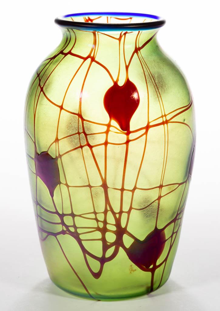 IMPERIAL FREE HAND HEART AND VINE ART GLASS VASE: IMPERIAL FREE HAND HEART AND VINE ART GLASS VASE, green iridescent with maroon decoration, Free Hand No. 313, applied cobalt blue rim, polished pontil mark. Imperial Glass Co. Circa 1925. 7" H, 2 7/8"