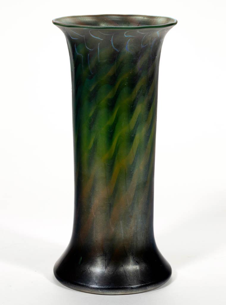 KEW BLAS DAMASCENE ART GLASS VASE: KEW BLAS DAMASCENE ART GLASS VASE, amber with green and blue decoration, cylindrical form with a flaring mouth and base, polished pontil mark signed "KEW BLAS". Union Glass Company. 1890-1924. 8" H, 3