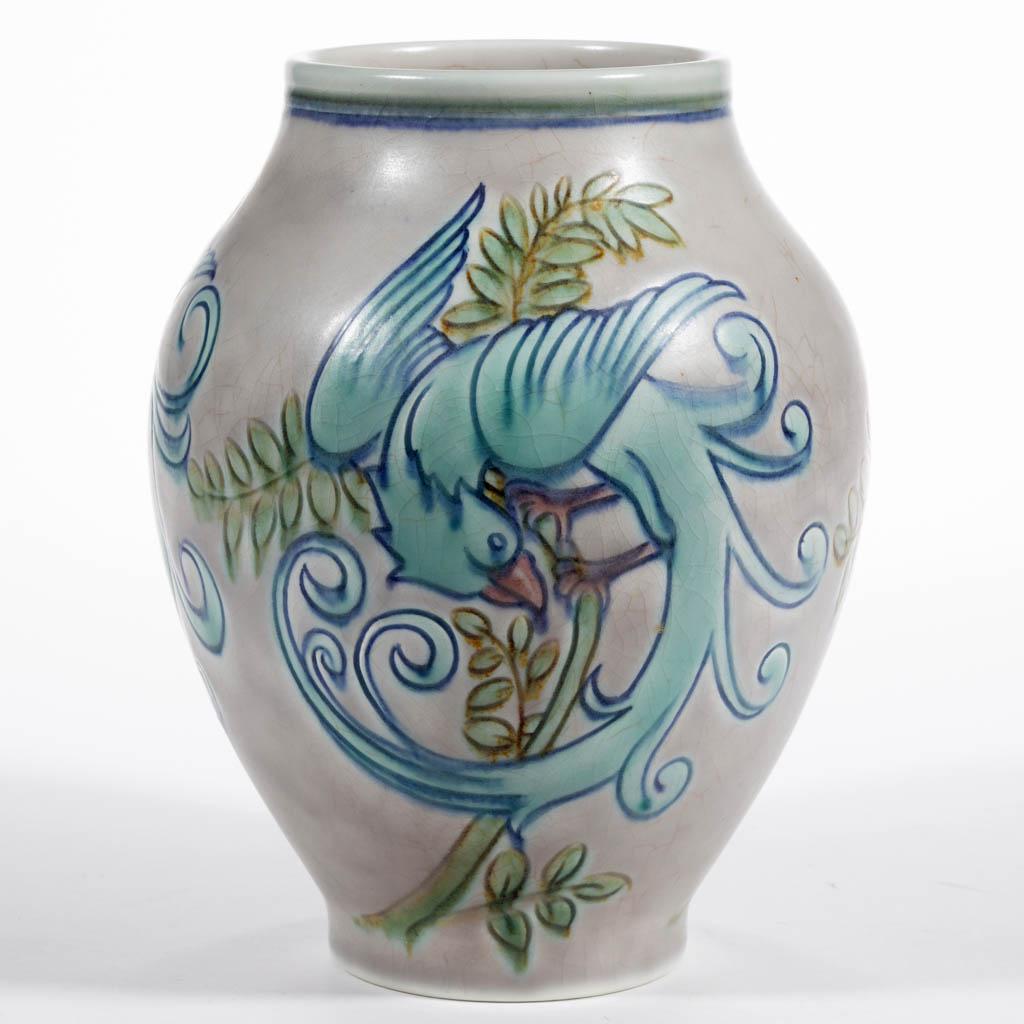 ENGLISH ROYAL LANCASTRIAN ART POTTERY VASE: ENGLISH ROYAL LANCASTRIAN ART POTTERY VASE, having Lapis Ware color palette, featuring three identical incised exotic birds with curling tails and perched on branches. Stamped "ROYAL / LANCASTRIAN", "