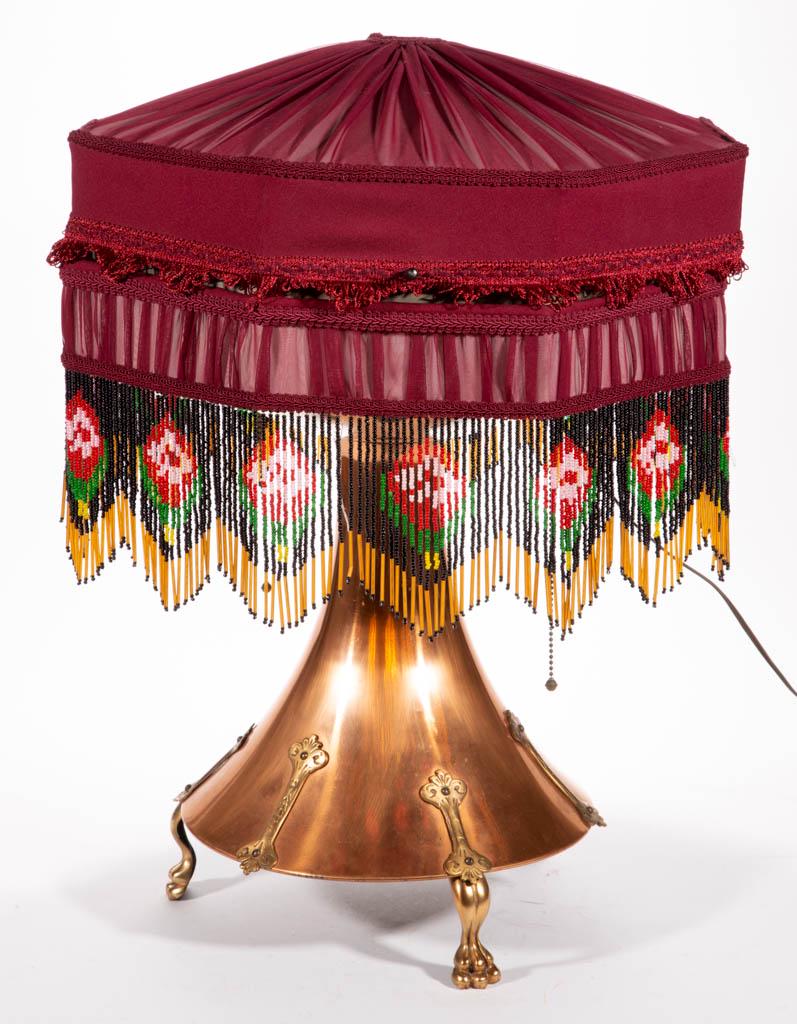 BURNS-POLLOCK ELECTRIC MFG. CO. PHONOGRAPH LAMP: BURNS-POLLOCK ELECTRIC MFG. CO. PHONOGRAPH LAMP, with cooper base and brass claw feet, serial number 403, Style OA412, with shade. Circa 1915. 21" H rim.Very good overall condition, with areas of expe