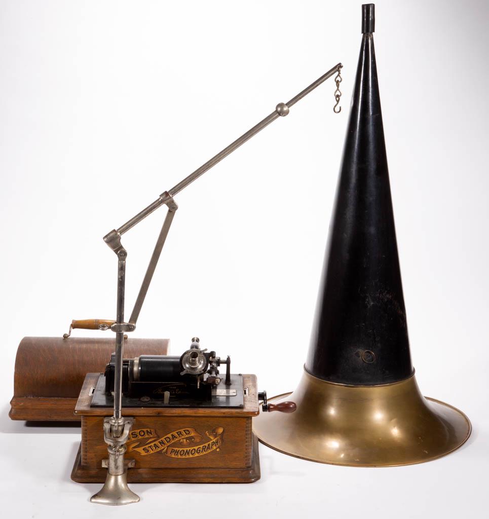 EDISON STANDARD PHONOGRAPH: EDISON STANDARD PHONOGRAPH, Model A, oak dome-top case, with horn crane, and horn. Reproducer stamped "27675". Retains likely original surface. Circa 1900. 8 1/4" HOA, 8 1/4" x 12 1/4". Very good over