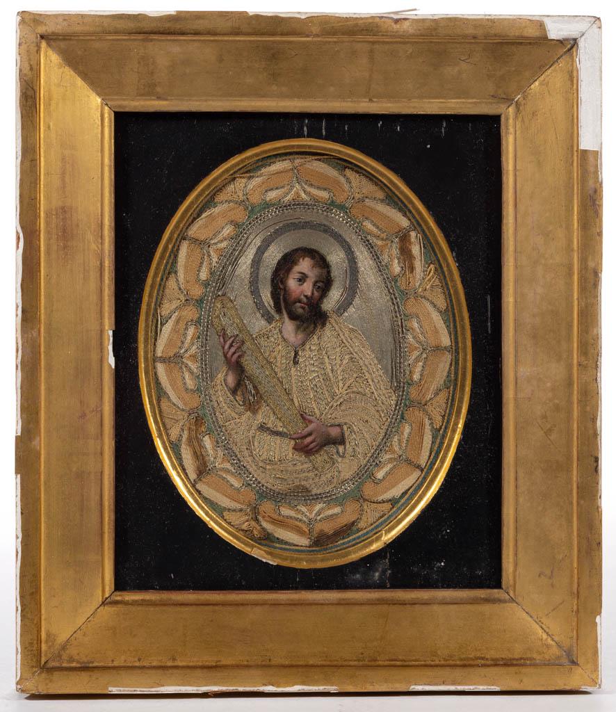 EUROPEAN, POSSIBLY RUSSIAN, NEEDLEWORK RIZA ICON: EUROPEAN, POSSIBLY RUSSIAN, NEEDLEWORK RIZA ICON, watercolor on paper, central haloed figure with painted head and hands covered with a needlework riza (oklad) in gilt and silk thread, paper mounted t