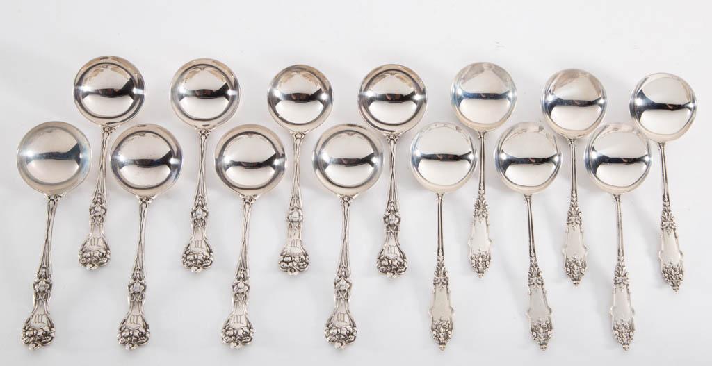 ALVIN AND WHITING MFG. CO. STERLING SILVER BOUILLON: ALVIN AND WHITING MFG. CO. STERLING SILVER BOUILLON SOUP SPOONS, LOT OF 14, comprising eight "Majestic" spoons by Alvin with engraved "W" initial to handle and six "St. Germaine" spoons by Whiting Mfg