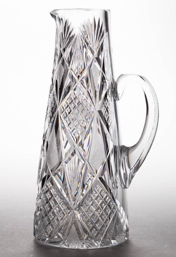 T. B. CLARK ATTRIBUTED HENRY VIII BRILLIANT CUT GLASS: T. B. CLARK ATTRIBUTED HENRY VIII BRILLIANT CUT GLASS CHAMPAGNE PITCHER, colorless, tapered form, applied zipper-cut handle, rayed base, no noticeable signature. T. B. Clark and Co. Fourth quarter 19t