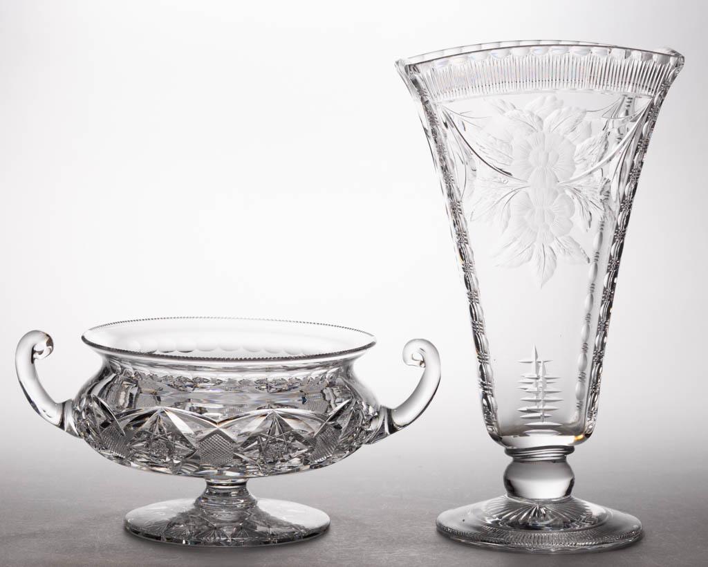 ASSORTED CUT GLASS ARTICLES, LOT OF TWO: ASSORTED CUT GLASS ARTICLES, LOT OF TWO, colorless, comprising a double-handled footed bowl with a medial band of diamond and four-point star, and a rectangular fan vase with intaglio cut floral decor