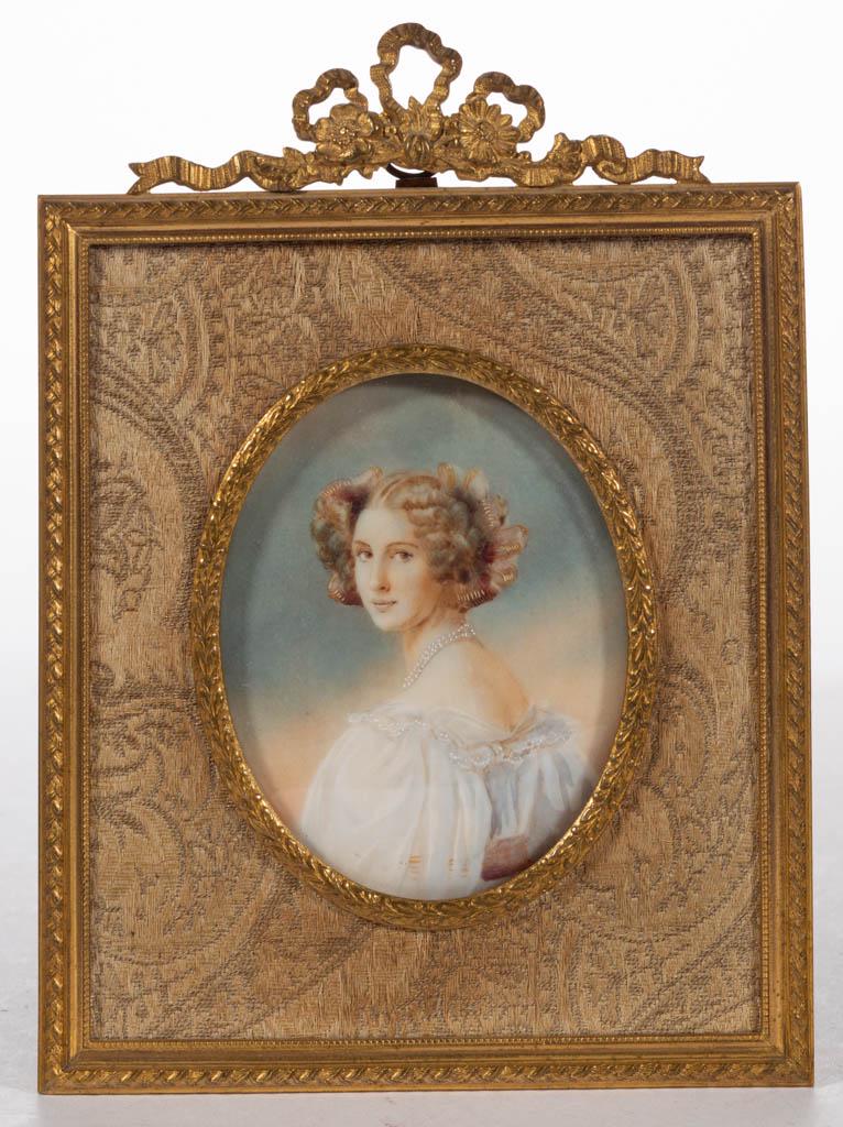 CONTINENTAL SCHOOL (LATE 19TH / EARLY 20TH CENTURY): CONTINENTAL SCHOOL (LATE 19TH / EARLY 20TH CENTURY) MINIATURE PORTRAIT OF A LADY, watercolor, sitter, wearing white off-the-shoulder gown, in profile, her face turned toward the viewer, no signature l
