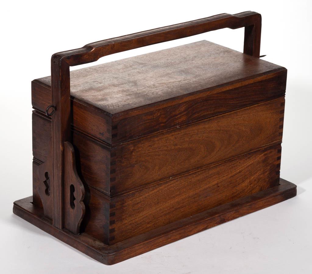CHINESE ROSEWOOD THREE-TIER PICNIC BOX: CHINESE ROSEWOOD THREE-TIER PICNIC BOX, three removable trays held in by a skewer. Retains likely original surface. Probably 20th century. 11" HOA, 7 1/3" x 13 3/4" OA (trays). Very good overall condi