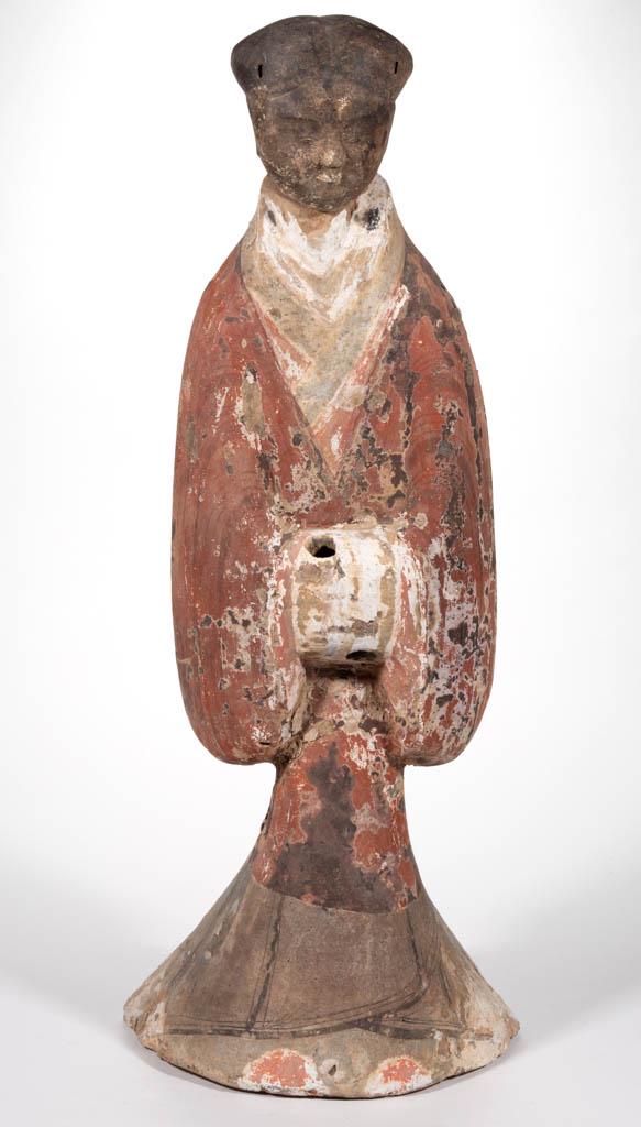 CHINESE EARTHENWARE LARGE TOMB FIGURE: CHINESE EARTHENWARE LARGE TOMB FIGURE, of a standing attendant in a robe with pigment remnants, head detached from body. Possibly Han dynasty, or later. 29" HOA. Good as-found condition with wear, los