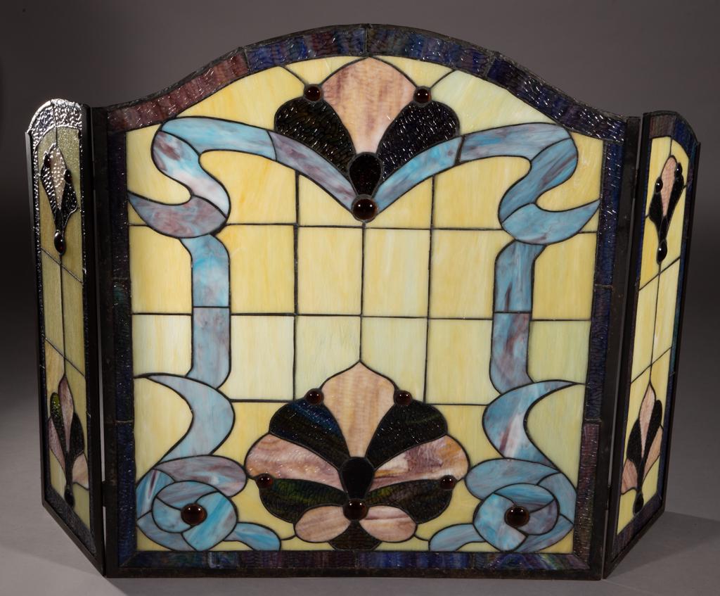 LEADED AND STAINED-GLASS TRIPTYCH: LEADED AND STAINED-GLASS TRIPTYCH, with later conversion to fire place screen. Three-pieces total. First half 20th century. Center piece 34 1/4" H. Very good overall condition, missing one pin, with s