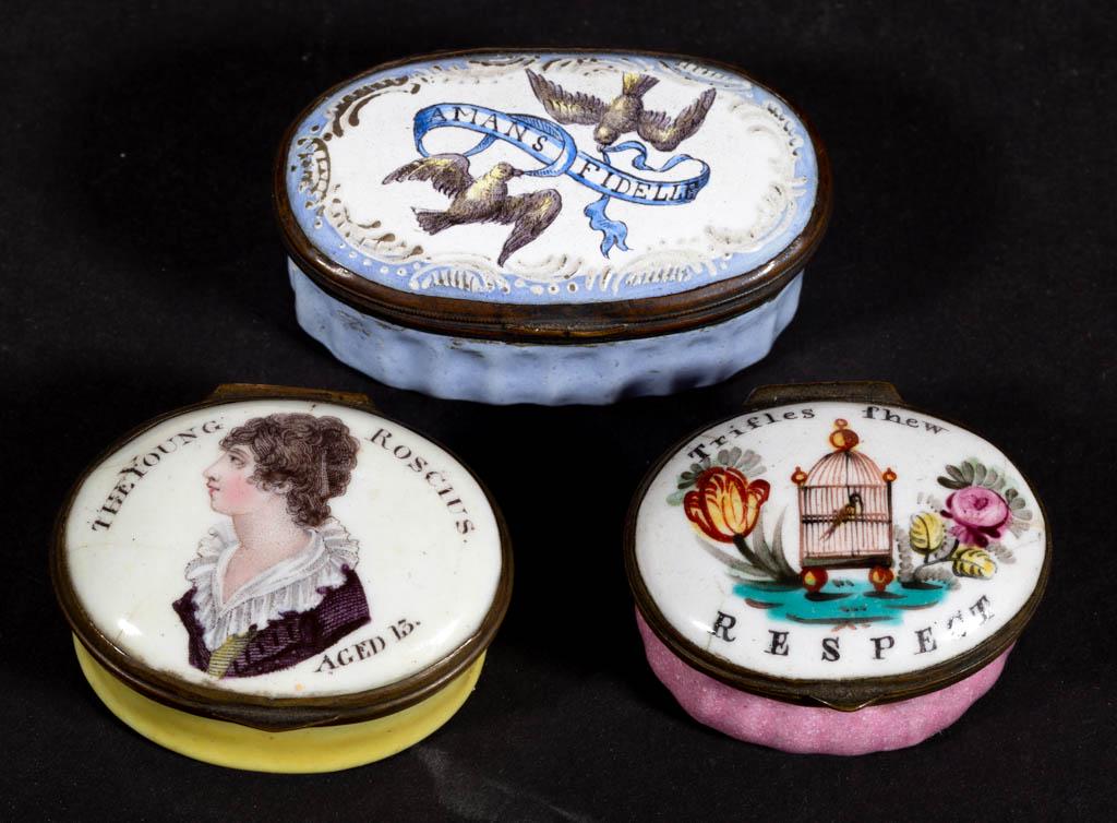 BATTERSEA / BILSTON ENAMEL SNUFF / PILL BOXES, LOT OF: BATTERSEA / BILSTON ENAMEL SNUFF / PILL BOXES, LOT OF THREE, each oval-shaped with hinged lid, one featuring a caged bird with flowers, inscribed "Trifle fhew / RESPECT" with interior mirror, one havi