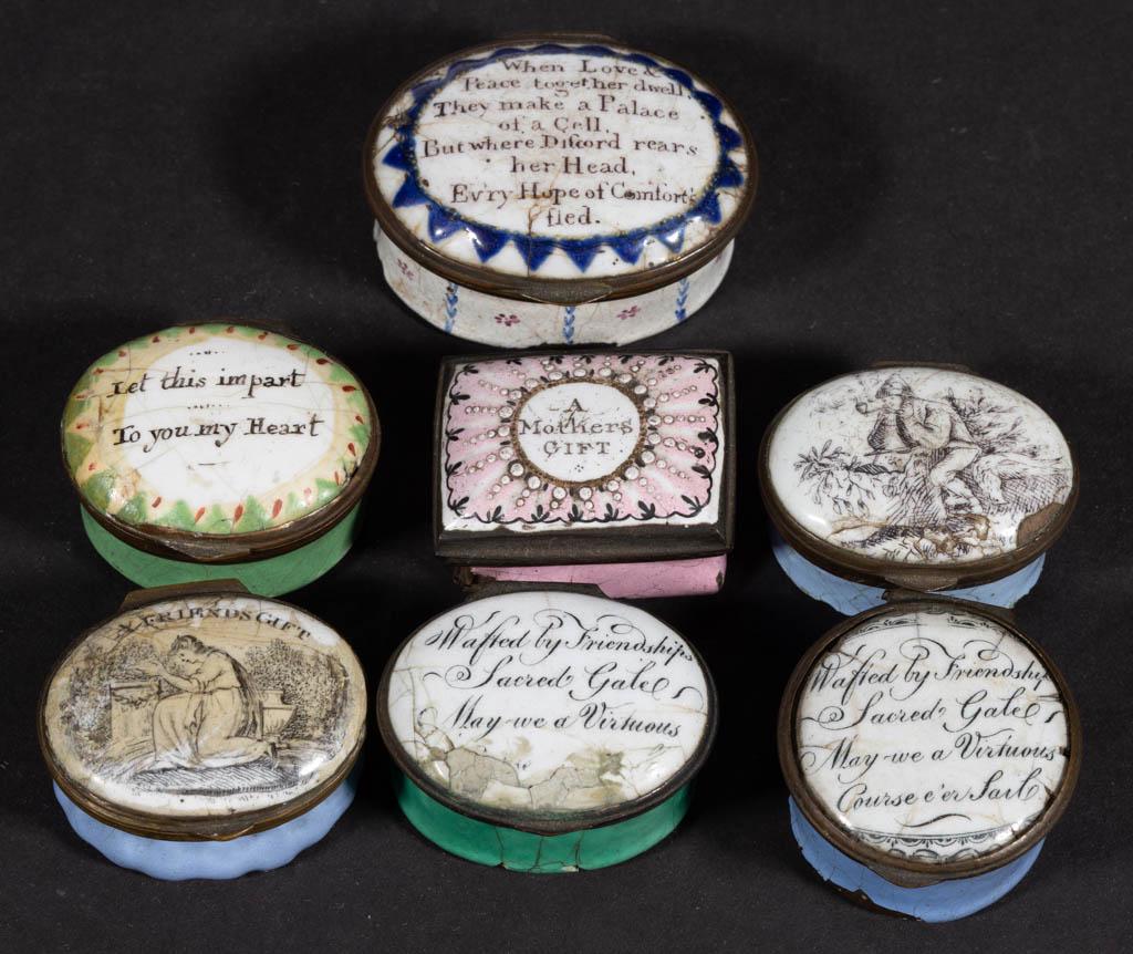 BATTERSEA / BILSTON ENAMEL SNUFF / PILL BOXES, LOT OF: BATTERSEA / BILSTON ENAMEL SNUFF / PILL BOXES, LOT OF SEVEN, including five oval-shaped examples with inscriptions including "Let this impart / To you my Heart" and "A FRIENDS GIFT" and one featuring 