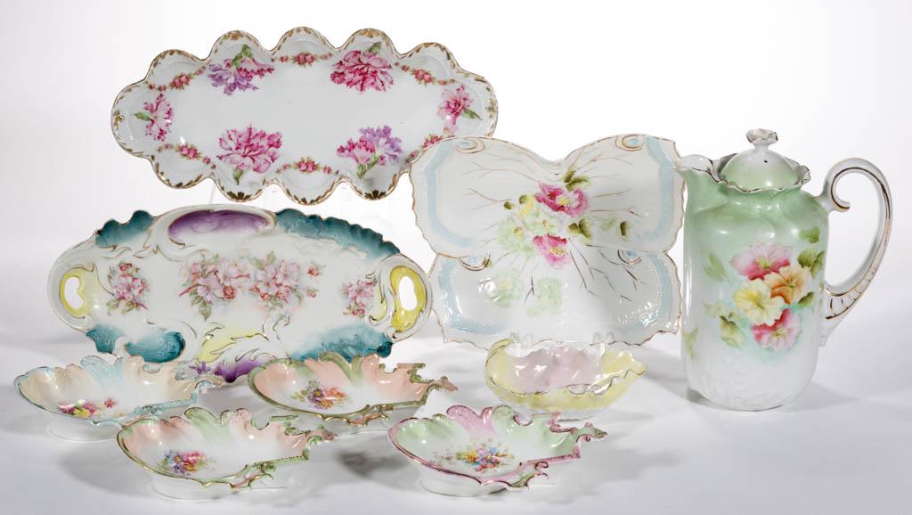 R.S. PRUSSIA AND OTHER PORCELAIN TABLE ARTICLES, LOT OF: R.S. PRUSSIA AND OTHER PORCELAIN TABLE ARTICLES, LOT OF NINE, each having polychrome floral decorations with gilt highlights, including a butterfly-shaped dish, a shell-shaped footed dish, four irregu