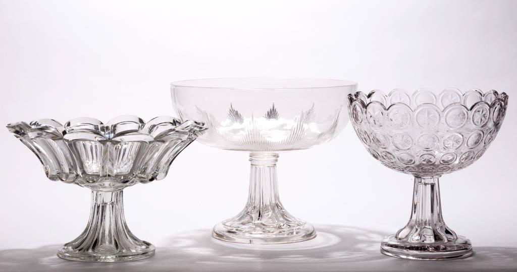 ASSORTED FLINT EAPG OPEN COMPOTES, LOT OF THREE: ASSORTED FLINT EAPG OPEN COMPOTES, LOT OF THREE, colorless lead glass, comprising a 12-loop, a Blaze on a Washington pattern standard, and an Early Moon and Star Variant. Various makers. Third quarter