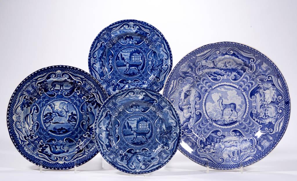 ENGLISH STAFFORDSHIRE PEARLWARE TRANSFER-PRINTED: ENGLISH STAFFORDSHIRE PEARLWARE TRANSFER-PRINTED "QUADRUPEDS" CERAMIC PLATES, LOT OF FOUR, each having dark blue transfer images with various animals in border medallions, comprising two featuring a "