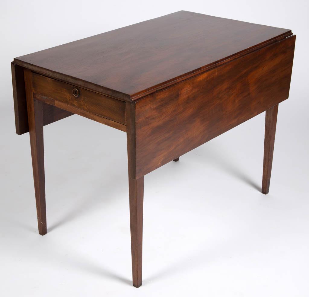VIRGINIA / NORTH CAROLINA WALNUT FALL-LEAF BREAKFAST /: VIRGINIA / NORTH CAROLINA WALNUT FALL-LEAF BREAKFAST / PEMBROKE TABLE, rectangular top fitted with two hinged fall leaves, one full length drawer, raised on square-tapered legs, with key. Yellow pine