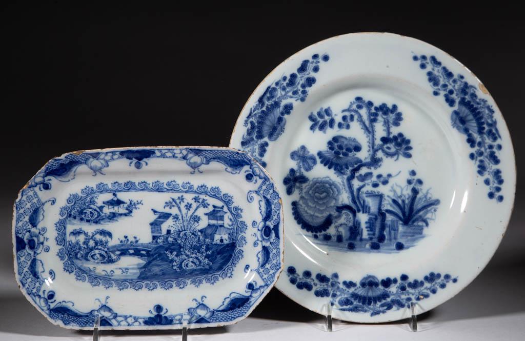 IRISH / SCOTTISH DELFT TIN-GLAZED CHINOISERIE: IRISH / SCOTTISH DELFT TIN-GLAZED CHINOISERIE EARTHENWARE PLATE AND TRAY, LOT OF TWO, comprising one circular plate, likely made in Scotland, featuring floral sprays on rim and interior with floral an