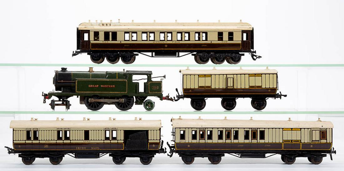 LNWR O-GAUGE TIN PASSENGER CARS WITH HORNBY LOCOMOTIVE,: LNWR O-GAUGE TIN PASSENGER CARS WITH HORNBY LOCOMOTIVE, LOT OF FIVE, comprising four cars having cream, light green, and brown-painted finish with gold-toned accents including a dining car, an Irish m