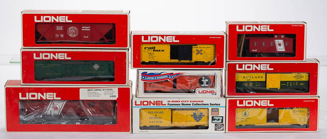 LIONEL O-GAUGE LOCOMOTIVE AND FREIGHT CARS, LOT OF NINE: LIONEL O-GAUGE LOCOMOTIVE AND FREIGHT CARS, LOT OF NINE, comprising a No. 8550 Jersey Central diesel locomotive, a Jersey Central lighted caboose, a Detroit & Mackinac hopper, an REA reefer car, and f