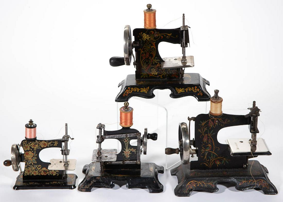 GERMAN METAL CHILD'S TOY SEWING MACHINES, LOT OF FOUR: GERMAN METAL CHILD'S TOY SEWING MACHINES, LOT OF FOUR, each with stenciled decoration. One with "Made in Germany" to needle plate, some or all likely by F.W. Muller of Berlin. First half 20th century.