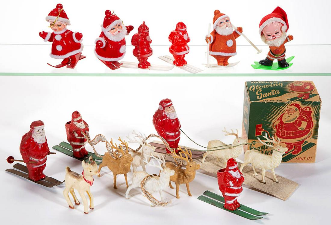 ASSORTED SANTA CLAUS AND OTHER FIGURES, LOT OF 12: ASSORTED SANTA CLAUS AND OTHER FIGURES, LOT OF 12, most made of plastic/celluloid and on skis, including a pair of Mr. and Mrs. Claus figures, a Rudolph figure, and a Miller "Santa Glowing" light-up f