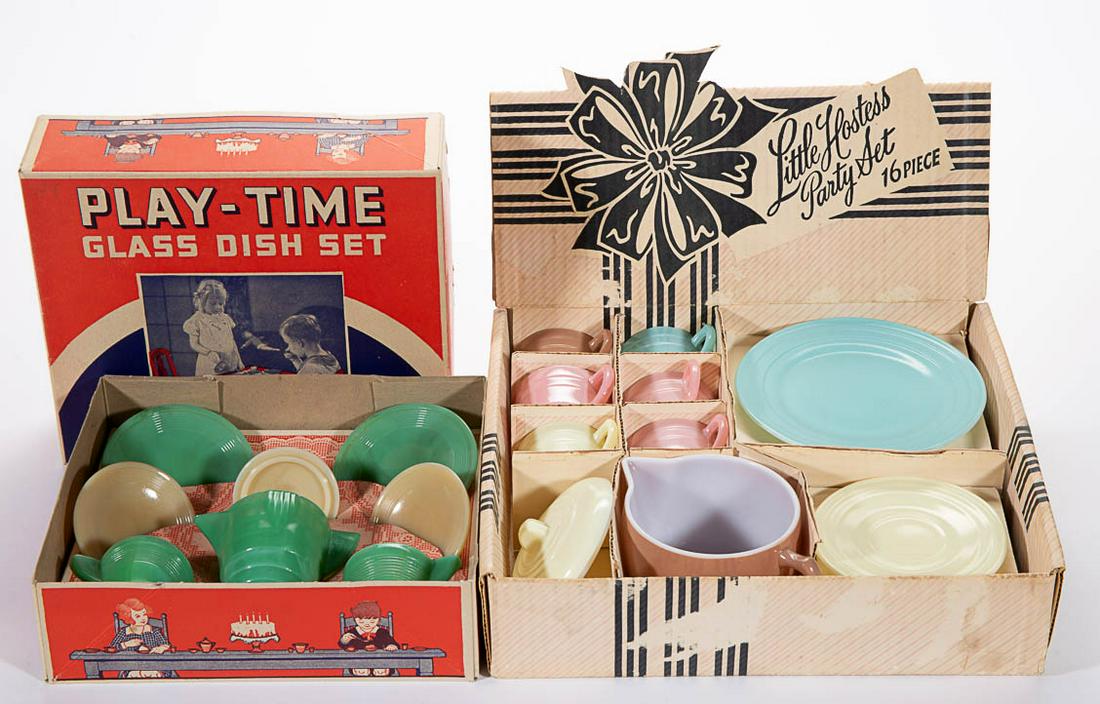 ASSORTED PRESSED CHILDREN: ASSORTED PRESSED CHILDREN'S GLASS TOY TEA SETS, LOT OF TWO, various colors, comprising a seven-piece Akro Agate, and a 15-piece "Little Hostess" set. Various makers. Second quarter 20th century. Akro