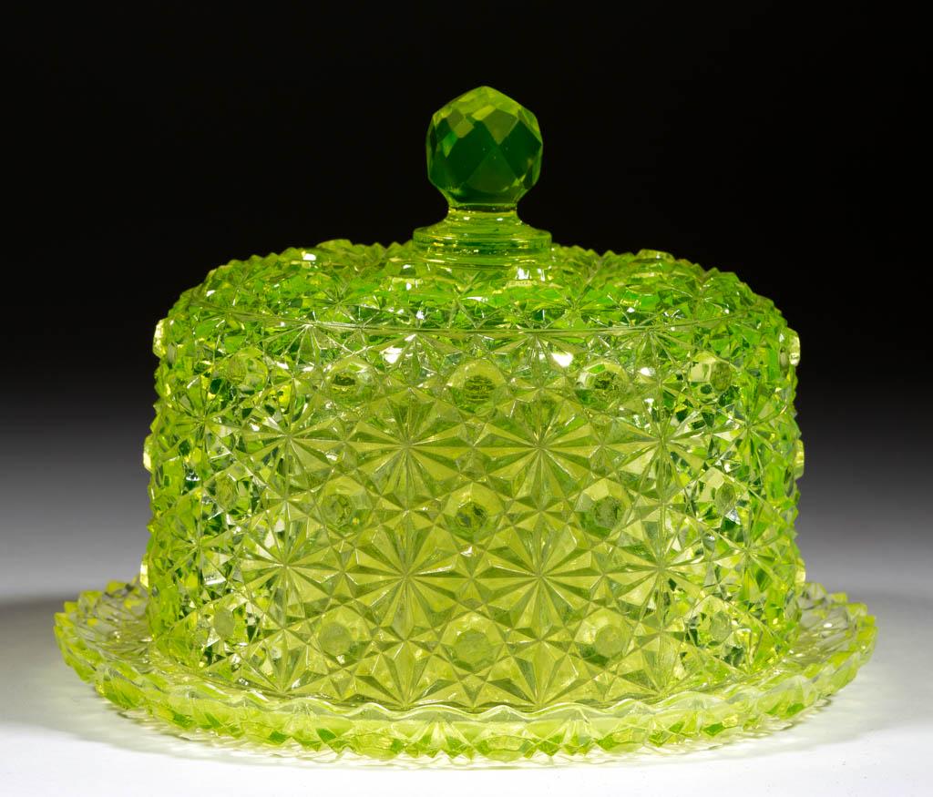 HOBBS NO. 101 / DAISY AND BUTTON COVERED BUTTER DISH: HOBBS NO. 101 / DAISY AND BUTTON COVERED BUTTER DISH, Vaseline (reacts under black light), matching underplate. Hobbs, Brockunier & Co. Circa 1884. 5" HOA, 6 3/4" D underplate. Undamaged. Some light r