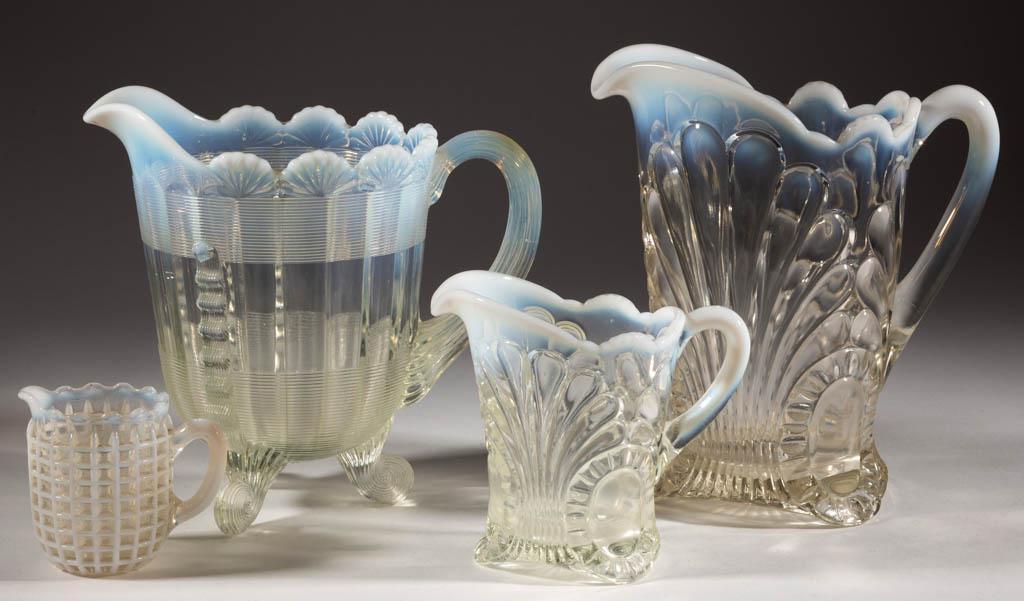 ASSORTED PRESSED OPALESCENT ARTICLES, LOT OF FOUR: ASSORTED PRESSED OPALESCENT ARTICLES, LOT OF FOUR, colorless opalescent, comprising a Tokyo water pitcher and creamer, a Klondyke water pitcher, and a Beatty Waffle creamer. Various makers. Late 19th/