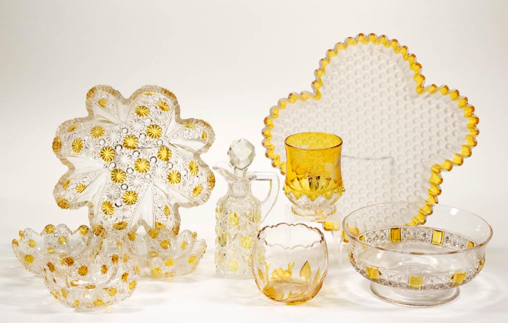 ASSORTED EAPG - AMBER-STAINED TABLE ARTICLES, LOT OF: ASSORTED EAPG - AMBER-STAINED TABLE ARTICLES, LOT OF NINE, colorless, including a Hobbs No. 323/Dewdrop lobed tray, a Hobbs' No. 101/Daisy and Button Star master berry bowl and three individual bowls,