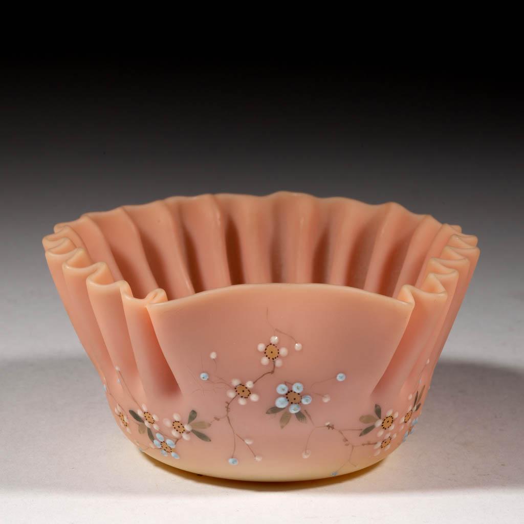 MT. WASHINGTON DECORATED BURMESE FINGER BOWL: MT. WASHINGTON DECORATED BURMESE FINGER BOWL, plush with polychrome-enamel decoration, crimped rim and floral decoration, polished pontil mark. Mt. Washington Glass Co. 1885-1895. 1 3/4" H, 3 1/2" D r