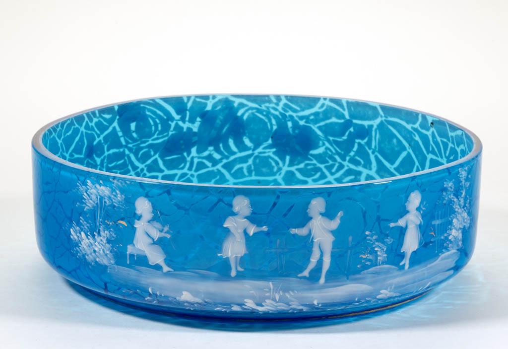 VICTORIAN MARY GREGORY (SO-CALLED) SNOWSTORM-TYPE GLASS: VICTORIAN MARY GREGORY (SO-CALLED) SNOWSTORM-TYPE GLASS BOWL, blue with opal decoration, depicting four children to one face with one playing a violin, other with floral decoration. Maker unverified. 