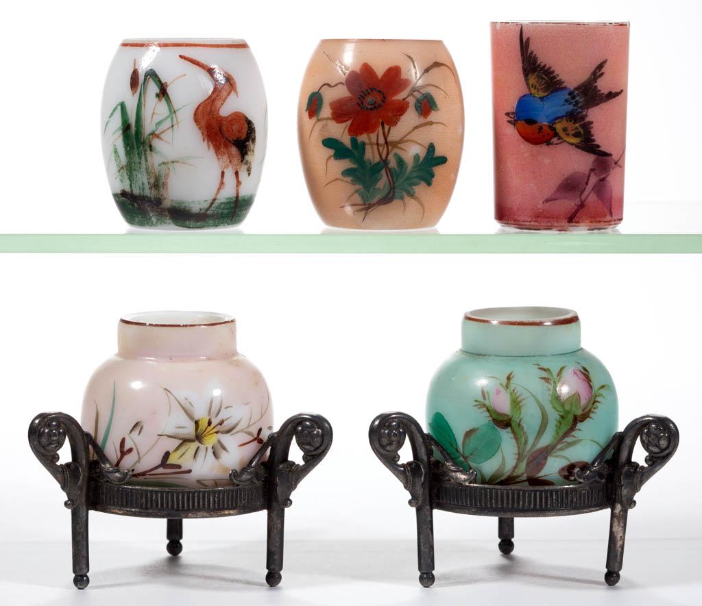 OPAL DECORATED TOOTHPICK HOLDERS, LOT OF FIVE: OPAL DECORATED TOOTHPICK HOLDERS, LOT OF FIVE, (updated 1/13/20) opaque white with enamel-decoration, comprising two barrel form, a cylindrical form, and two cauldron-form examples being fitted in mat