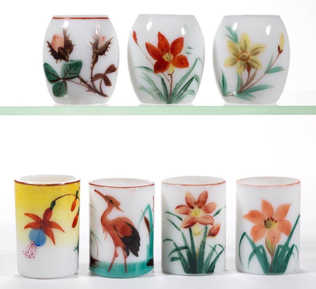 OPAL DECORATED TOOTHPICK HOLDERS, LOT OF SEVEN: OPAL DECORATED TOOTHPICK HOLDERS, LOT OF SEVEN, opaque white with enamel-decoration, comprising four cylindrical and three barrel forms. Various makers. Fourth quarter 19th century. 2 1/4" H.One cylin