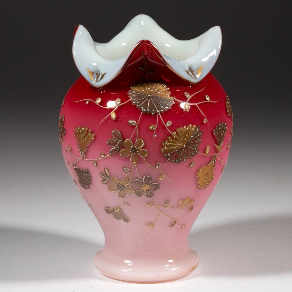 WEBB ENAMEL-DECORATED PEACHBLOW VASE: WEBB ENAMEL-DECORATED PEACHBLOW VASE, glossy with gilt enamel, globular form with attached rim, decoration depicting flowering branches and a butterfly, polished pontil mark. Thomas Webb & Sons. Fourt