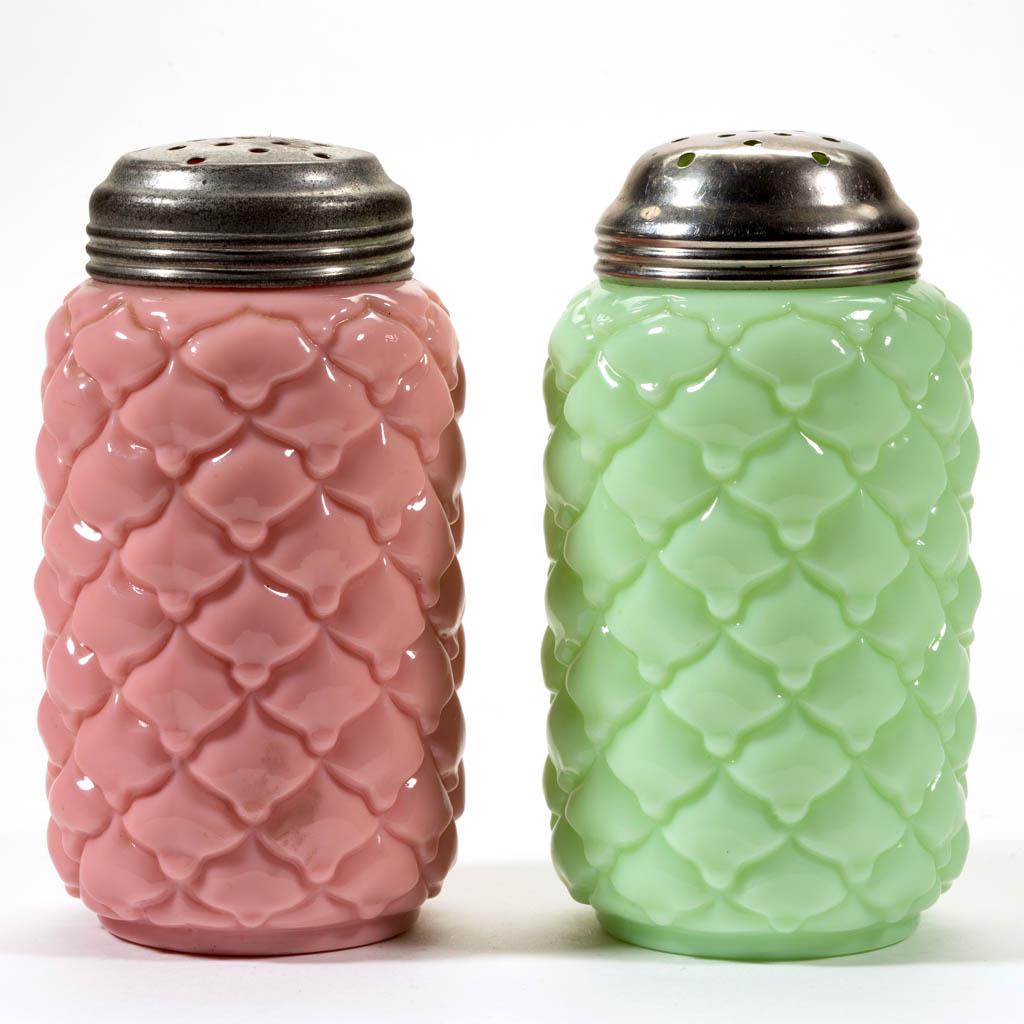 VICTORIAN CONE SUGAR SHAKERS, LOT OF TWO: VICTORIAN CONE SUGAR SHAKERS, LOT OF TWO, cased pink and opaque green, period lids. Consolidated Lamp & Glass Co. Fourth quarter 19th century. 5" HOA. Undamaged, minor imperfections to lids. Typical m