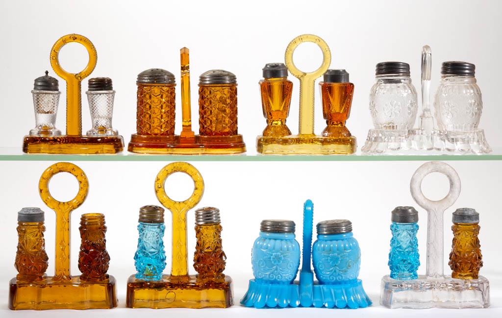 ASSORTED GLASS SALT AND PEPPER SHAKER SETS, LOT OF: ASSORTED GLASS SALT AND PEPPER SHAKER SETS, LOT OF EIGHT, various colors, including a Clemantis and Scroll, and three Daisy examples. Various makers. Late 19th/early 20th century. 4 1/2" to 6" HOA. So
