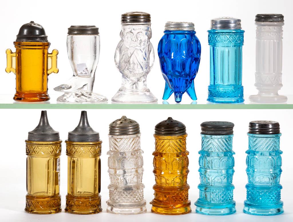 ASSORTED PRESSED GLASS SALT AND PEPPER SHAKERS, LOT OF: ASSORTED PRESSED GLASS SALT AND PEPPER SHAKERS, LOT OF 16, various colors, including a Figural Boot, three Spirea Band, and a figural Benjamin Franklin. Various makers. Fourth quarter 19th/early 20th 