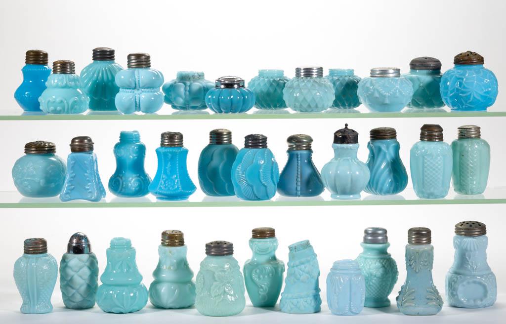 ASSORTED OPAQUE GLASS SALT AND PEPPER SHAKERS, LOT OF: ASSORTED OPAQUE GLASS SALT AND PEPPER SHAKERS, LOT OF 34, blue, including a Cord and Tassel, and two Sunset examples, 27 having a period lid. Various makers. Late 19th/early 20th century. 1 1/2" to 3 