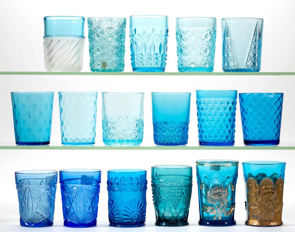 ASSORTED TUMBLERS, LOT OF 17: ASSORTED TUMBLERS, LOT OF 17, blue, including two Oriental Poppy with gilt decoration, various Daisy and Button, and two Greentown No. 98 / Brazen Shield. Late 19th/first quarter 20th century. 3 3/4" 