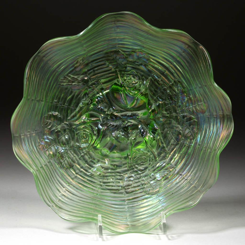 NORTHWOOD ROSE SHOW CARNIVAL GLASS BOWL: NORTHWOOD ROSE SHOW CARNIVAL GLASS BOWL, ice green, with ruffled edge. H. Northwood Co. First quarter 20th century. 9 1/8" DOA rim. Small bruise to rim, one rose bud with a chip possibly as made, othe