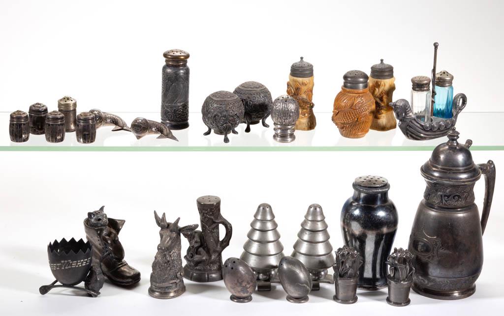 ASSORTED CONDIMENT ARTICLES, LOT OF 26: ASSORTED CONDIMENT ARTICLES, LOT OF 26, metal, wood, and ceramic, including a "WHITE METAL" syrup pitcher with monogrammed Gothic "T", a silver-plated sugar shaker, and 11 figural salt and pepper shak