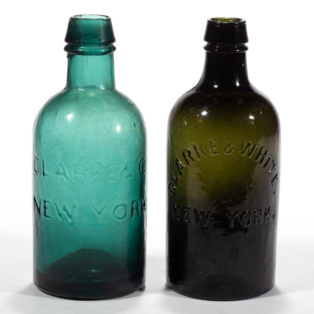 CLARKE, NEW YORK SPRING MINERAL WATER BOTTLES, LOT OF: CLARKE, NEW YORK SPRING MINERAL WATER BOTTLES, LOT OF TWO, pint size, comprising a medium teal example embossed "CLARKE & Co / NEW YORK", and a deep olive green example embossed "CLARKE & WHITE. / NEW