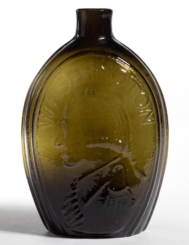 GI-31 WASHINGTON - JACKSON PORTRAIT / HISTORICAL FLASK: GI-31 WASHINGTON - JACKSON PORTRAIT / HISTORICAL FLASK, deep olive green, pint, obverse embossed "WASHINGTON", reverse embossed "JACKSON", plain mouth, rough pontil mark. Keene-Marlboro-Street Glasswo