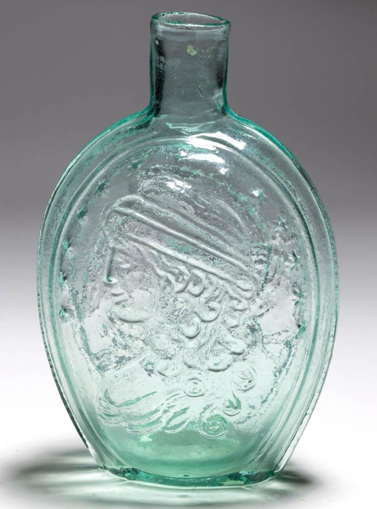 GI-121 COLUMBIA - EAGLE PORTRAIT / HISTORICAL FLASK: GI-121 COLUMBIA - EAGLE PORTRAIT / HISTORICAL FLASK, greenish aquamarine, pint, reverse embossed "B&W" in script below eagle, plain mouth, rough pontil mark. Unknown United States glass house. 1830-18