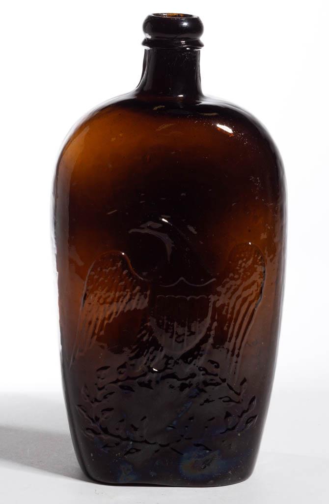 GII-61 EAGLE - WILLINGTON PICTORIAL / HISTORICAL FLASK: GII-61 EAGLE - WILLINGTON PICTORIAL / HISTORICAL FLASK, deep olive amber, quart, obverse embossed "LIBERTY" above eagle, and reverse embossed, "WILLINGTON / GLASS, Co / WEST WILLINGTON / CONN", applie