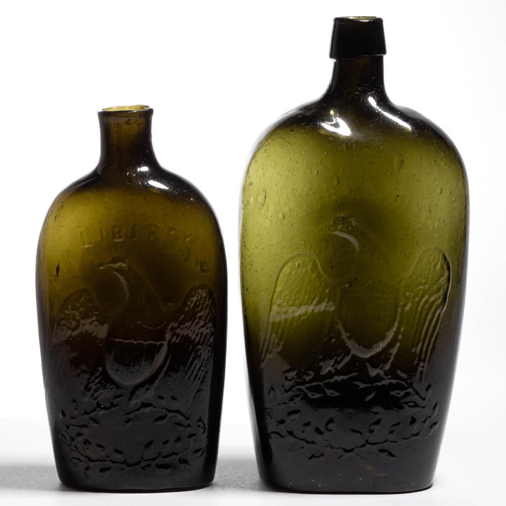 GII-61 AND GII-62 EAGLE - WILLINGTON PICTORIAL /: GII-61 AND GII-62 EAGLE - WILLINGTON PICTORIAL / HISTORICAL FLASKS, LOT OF TWO, deep olive green, quart and pint, each obverse embossed "LIBERTY" above eagle, and reverse embossed, "WILLINGTON / GLASS