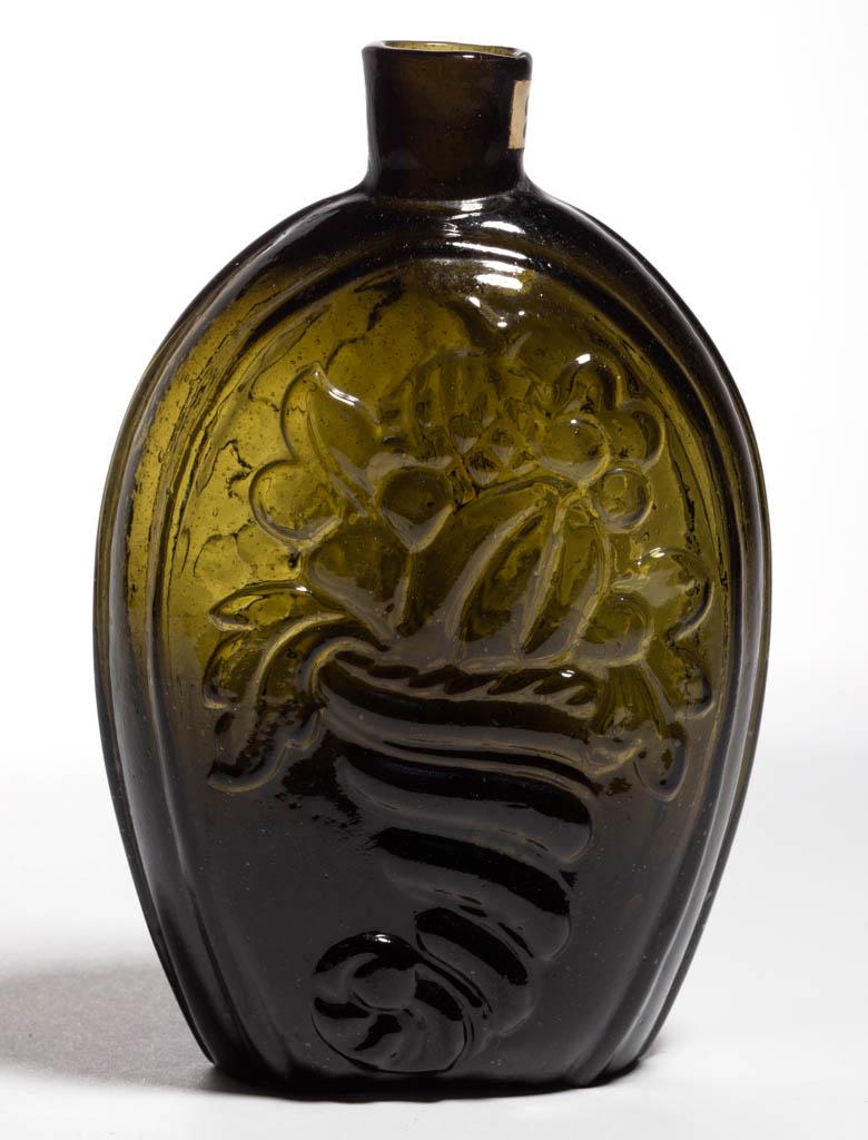 GIII-4 CORNUCOPIA - URN PICTORIAL FLASK: GIII-4 CORNUCOPIA - URN PICTORIAL FLASK, deep olive green, pint, plain mouth, rough pontil mark. Coventry Glassworks (1815-1848), Coventry, Connecticut. 1820-1848. 6 1/2" H. Undamaged with just a hint