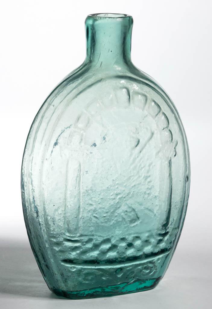 GIV-32 ZANESVILLE, OHIO MASONIC - EAGLE PICTORIAL /: GIV-32 ZANESVILLE, OHIO MASONIC - EAGLE PICTORIAL / HISTORICAL FLASK, greenish aquamarine, pint, reverse embossed "ZANESVILLE" above eagle, "OHIO" within oval, and "J. SHEPARD & CO", (S reversed) belo